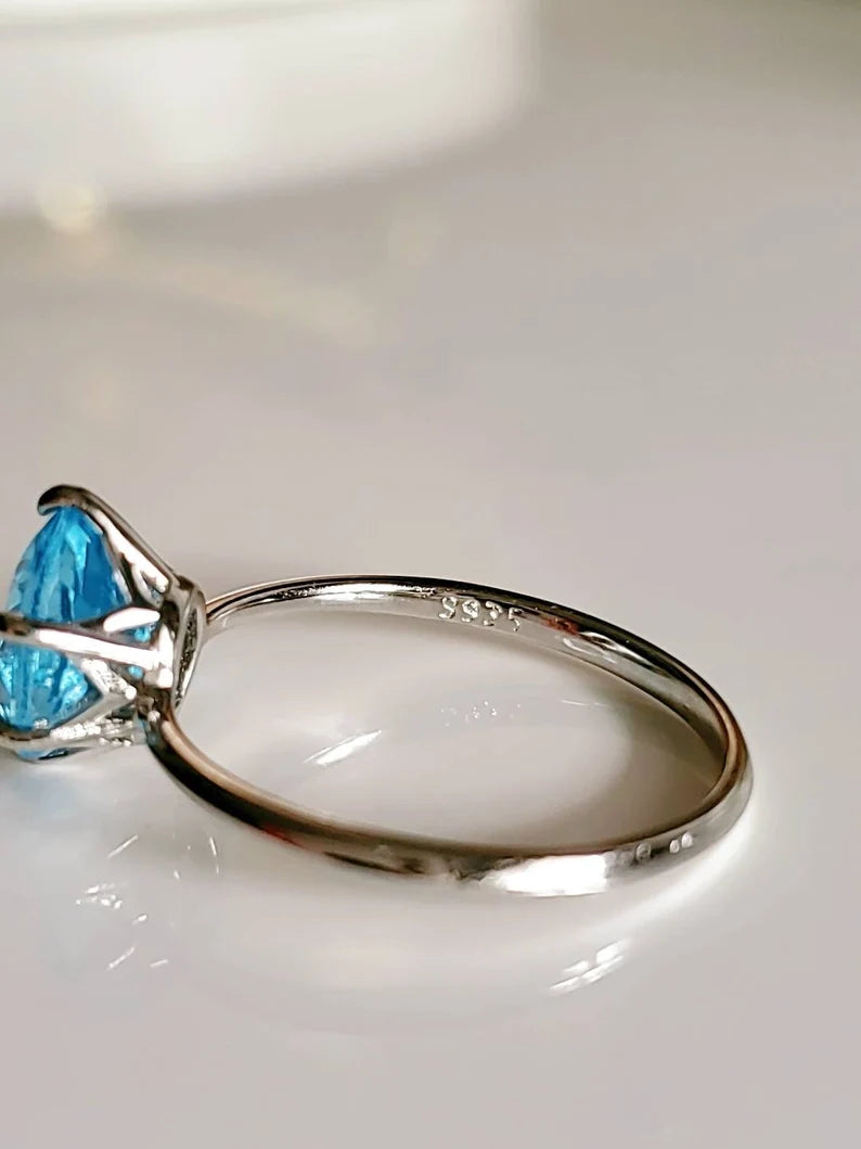 Solitaire Sterling Silver Topaz Ring
